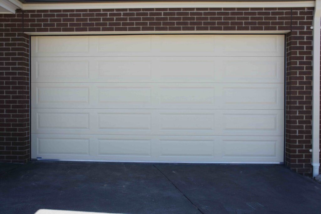 sectional garage door with rectangle embossments